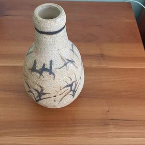 Unglazed painted pottery vase